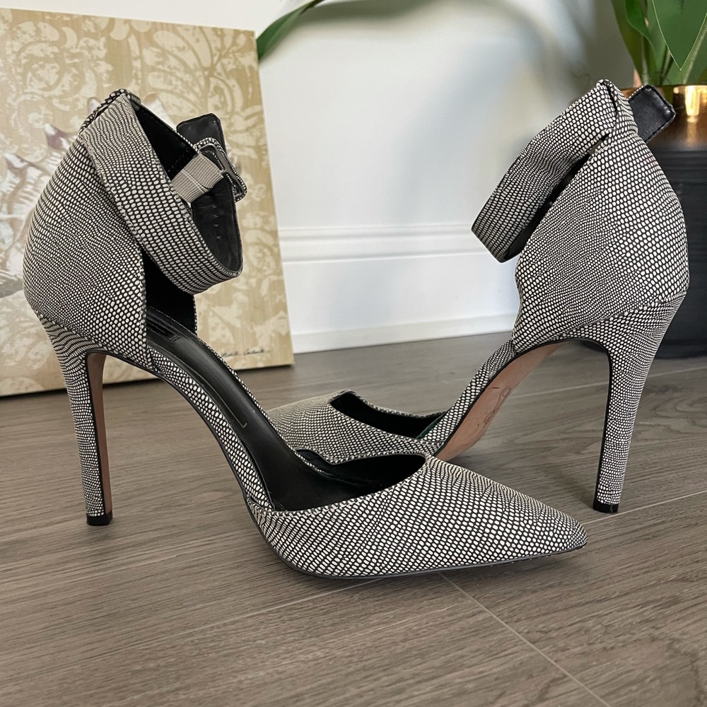 Back to business! Black and white office heels.